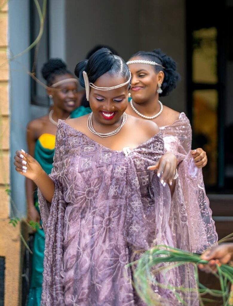 Bridesmaids in their beautiful Mushanana dresses during a bride's introduction ceremony planned by Nyom Planet