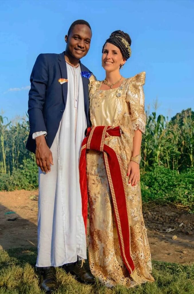 Pamela Muwanguzi, co-founder and director of the Dream Academy & Accelerator, and her husband Joshua, on their traditional wedding. Image Source: Medium