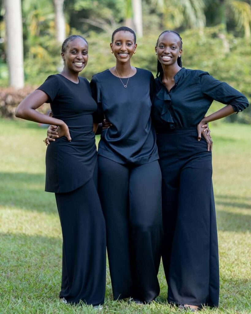 Izuba founder Ounkunda Liza Semakula (middle) pictured with her team of creatives Martha (on right) and Shena (on left). Image Source: Instagram/@izuba__
