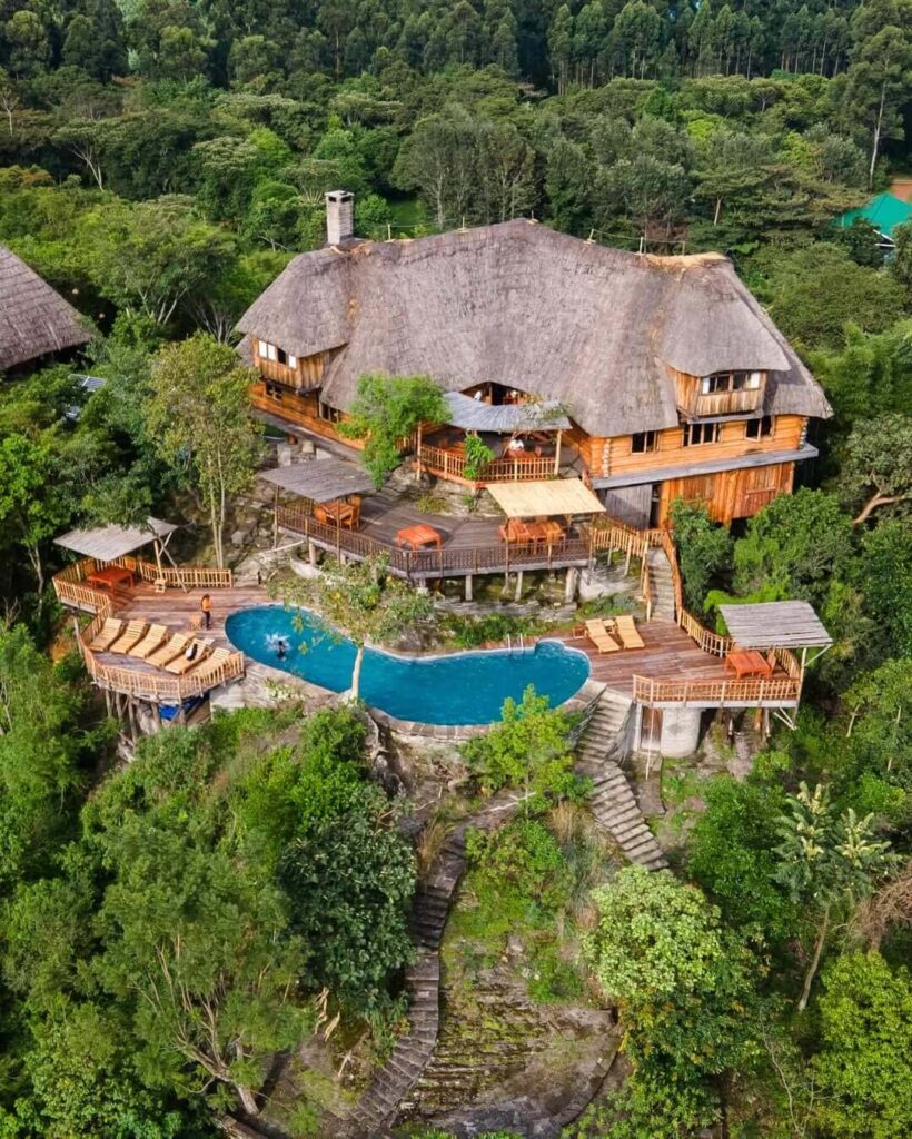 Kyaninga Lodge sits above Lake Kyaninga, 15 minutes outside Fort Portal, and is only a 4-hour drive from Kampala; it provides a beautiful forest view/garden and ballroom perfect for weddings. Image Source: Facebook/@KyaningaLodge