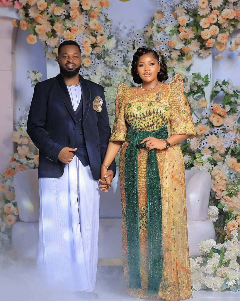 A beautiful Ugandan couple in their traditional outfits at their traditional wedding. Image Source: Instagram/@samiezweddings