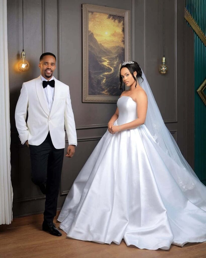 A beautiful Ugandan couple on their white wedding. Image Source: Instagram/@samiezweddings