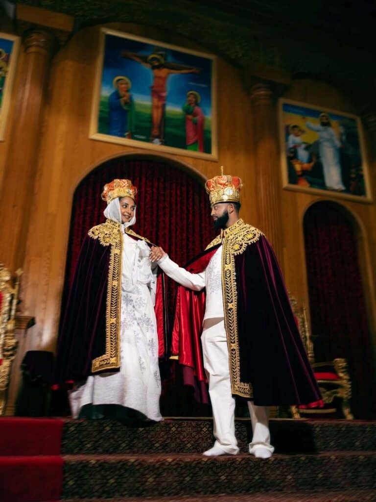 A beautiful couple, crowned as king and queen, photographed by Getnet Teshome at their Orthodox church wedding. Image Source: Instagram/@gettphotography