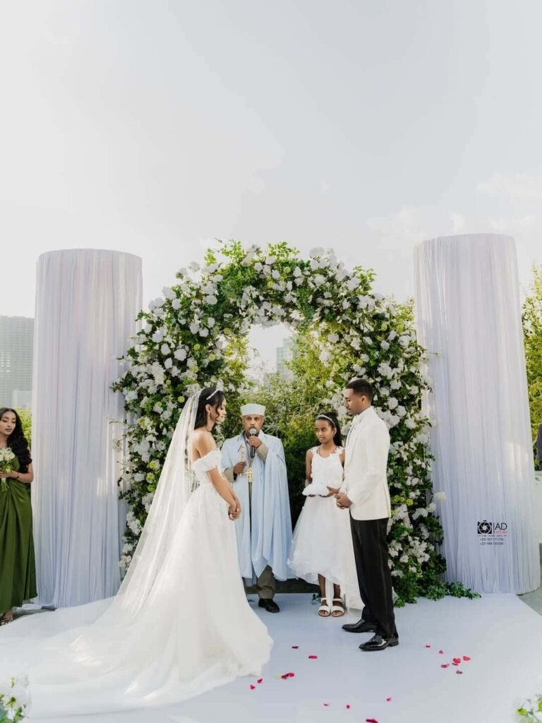 An Ethiopian couple on their white wedding, photographed by Adpictures. Image Source: Instagram/@adpictures_ethio