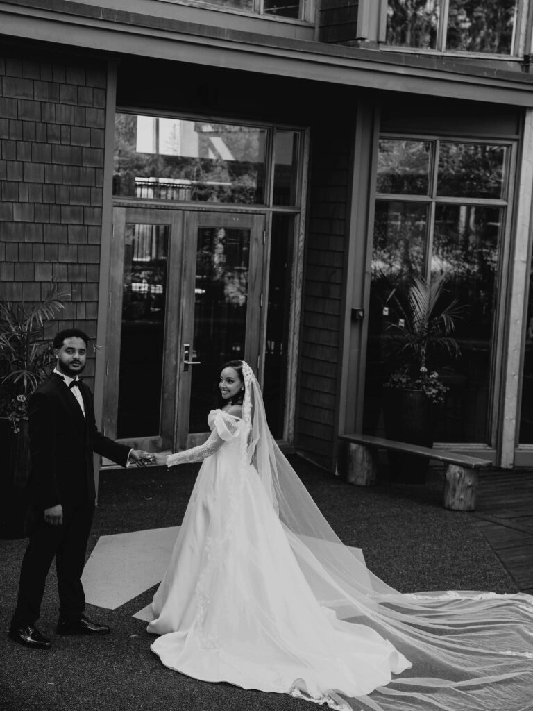 Saricho Z, a registered nurse and her spouse on their beautiful white wedding in Alberta photographed by J316Photographic
